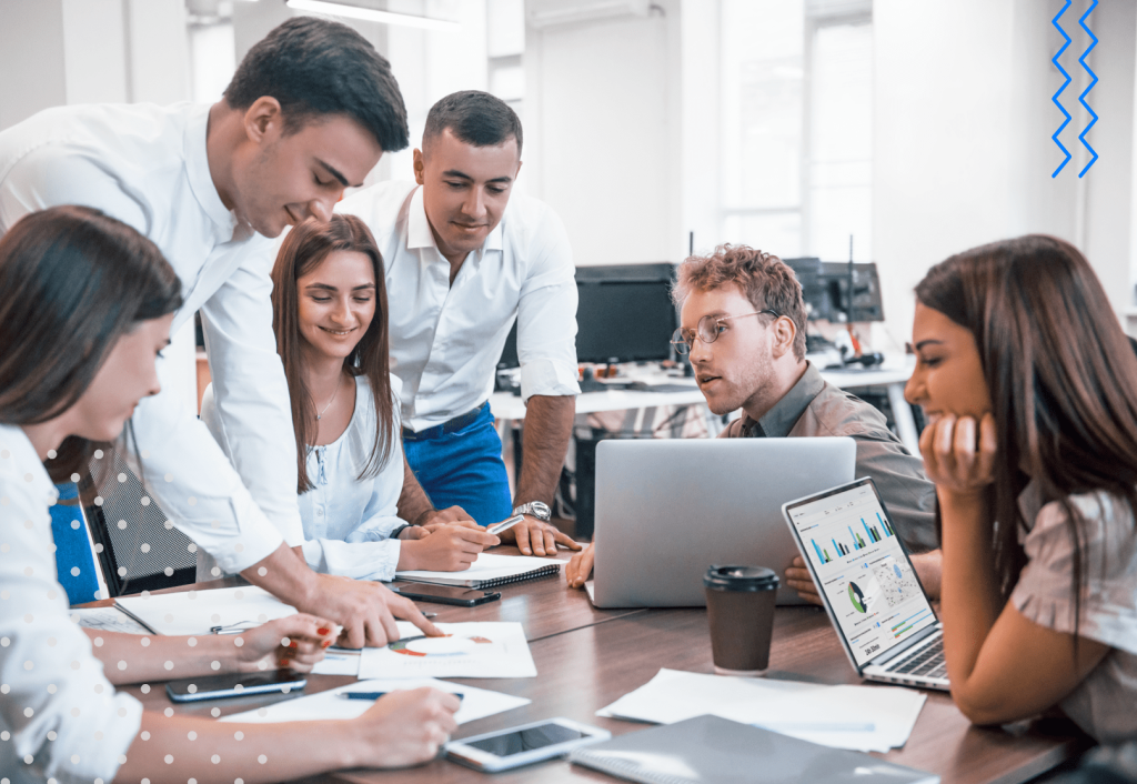 Employees in the office using business process automation tools.